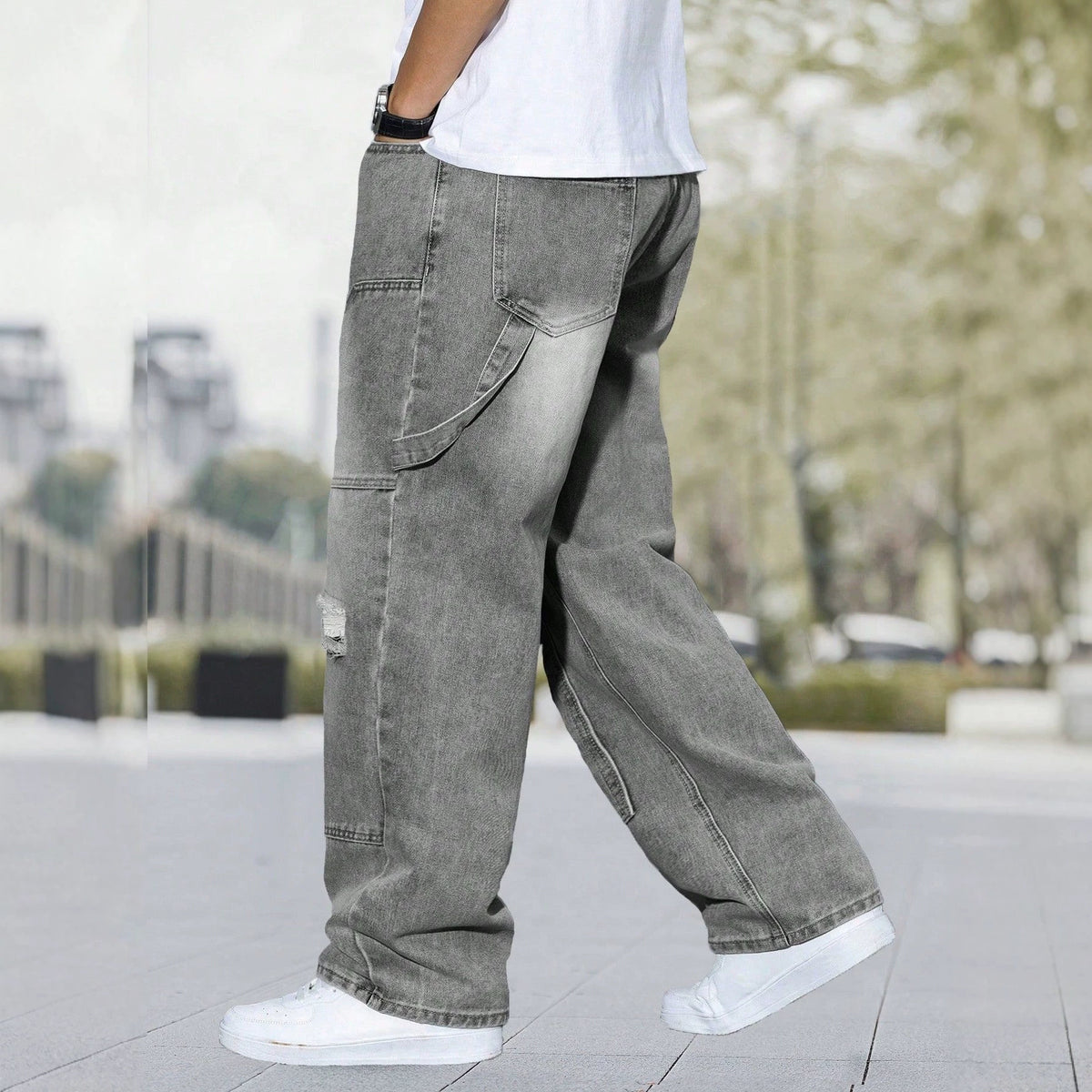 Stylish Men's Distressed Denim Jeans with Retro Wash and Patch Design